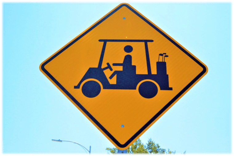 Photo of Sign designating Golf Cart Crossing