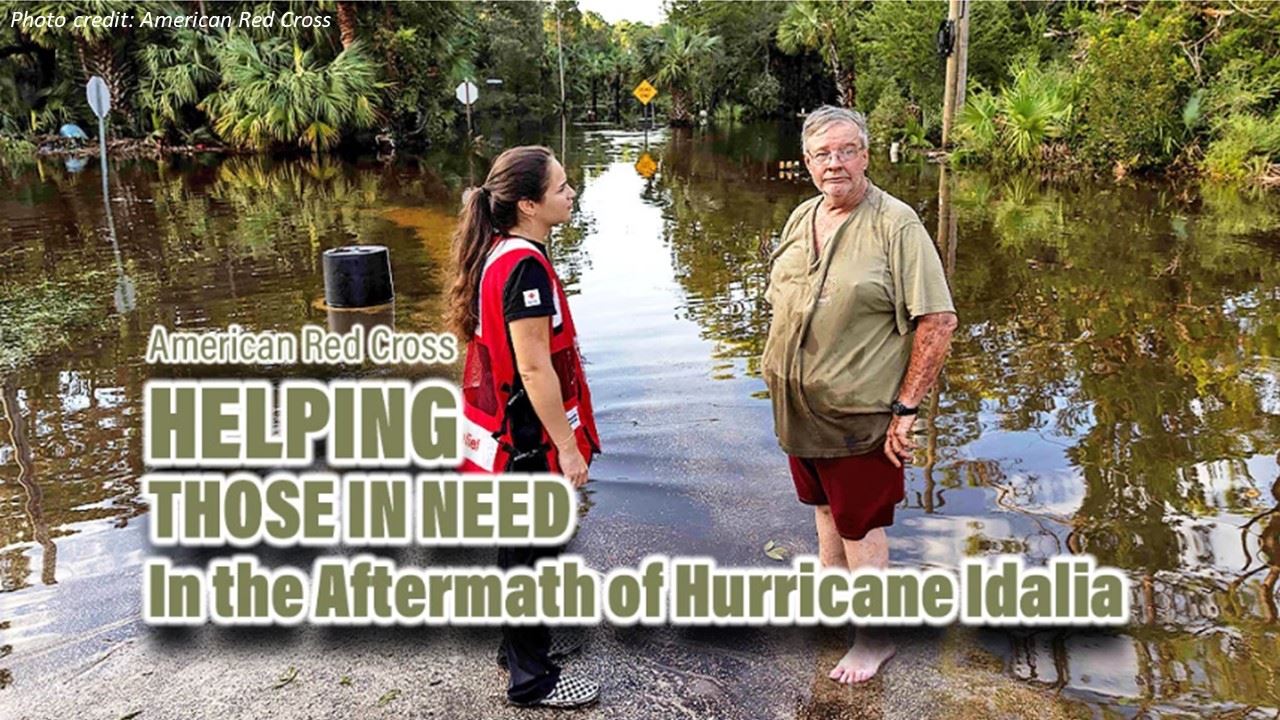 Photo of Am Red Cross Volunteer assisting a person 